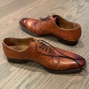 Barely worn brown men’s dress shoes size 10. Retails for $475.
